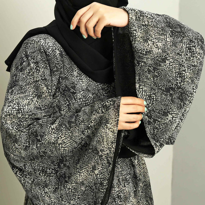 black textured abaya and hijaab