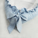 blue ruffled baby snuggle bed
