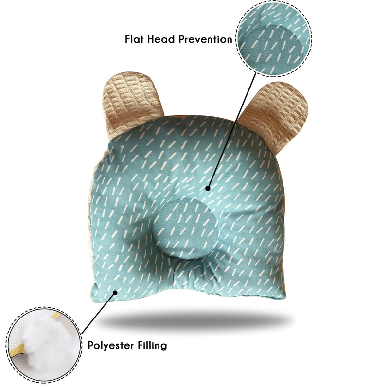 dotted blue head shaping cushion