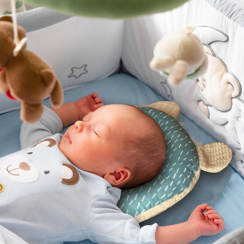 dotted blue head shaping cushion