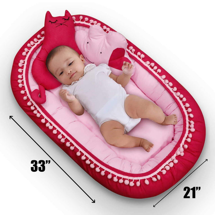 bright pink baby snuggle bed