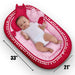 bright pink baby snuggle bed